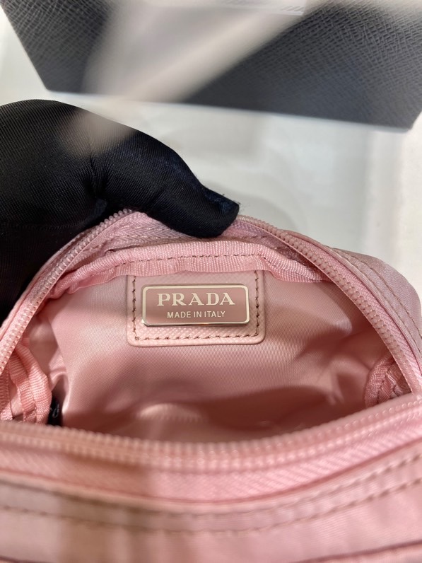Pra*a clutch bags
